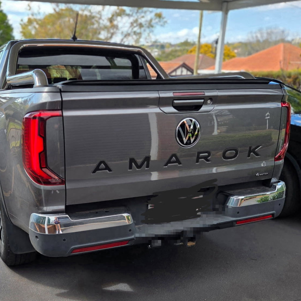 Black AMAROK tailgate infill lettering fitted to a grey Volkswagen Amarok