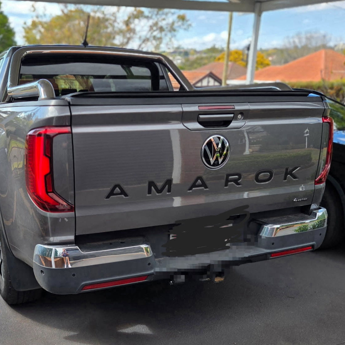 Black AMAROK tailgate infill lettering fitted to a grey Volkswagen Amarok